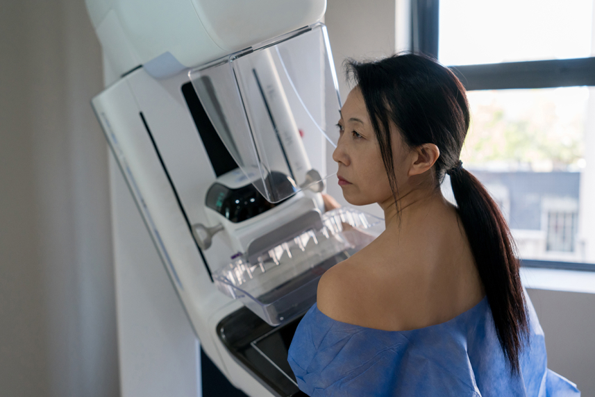 Woman getting mammogram
