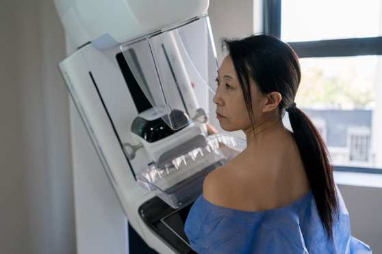 Woman getting mammogram